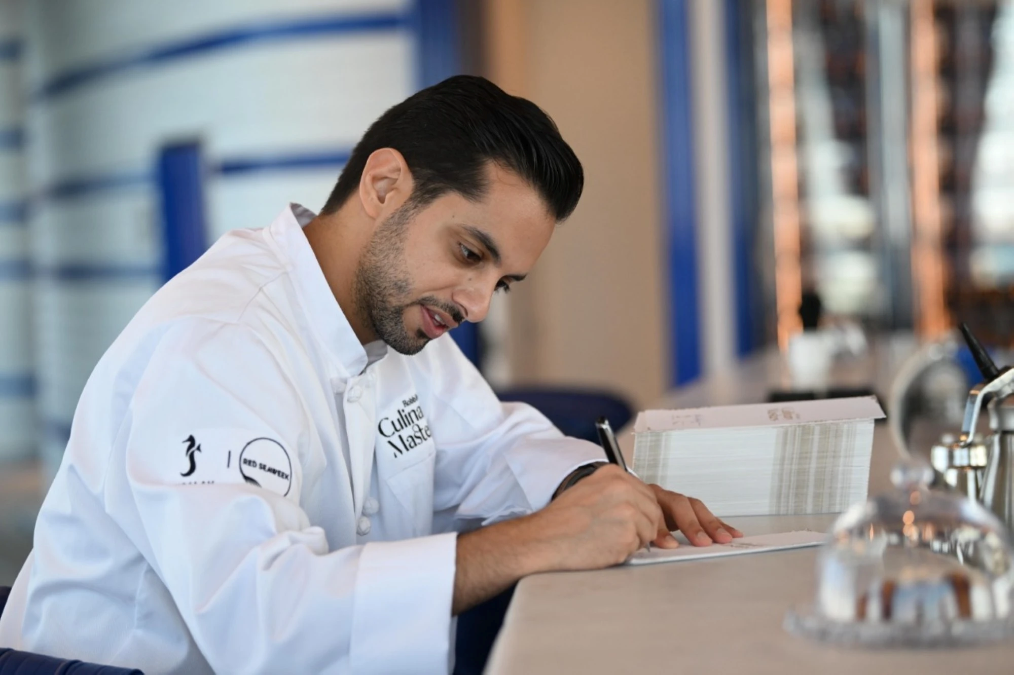 Chef Rakan writing
